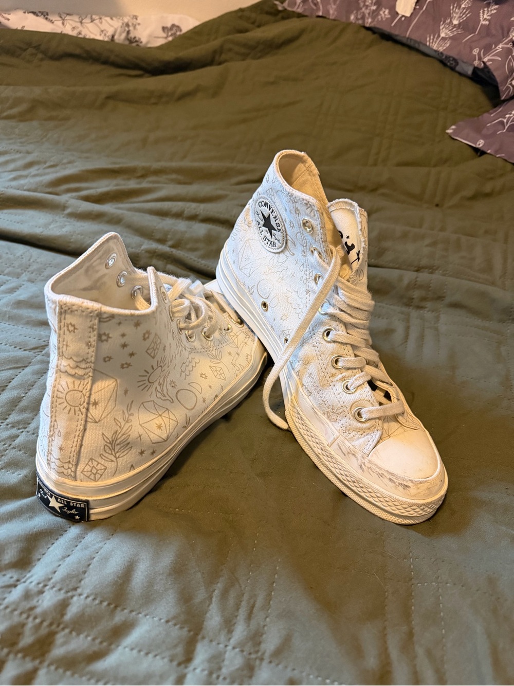 Converse White High-Top Canvas Sneakers with Subtle Line Art Print